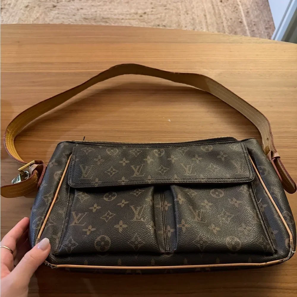 Authentic Louis Vuitton Red Interior with Gold Tag
